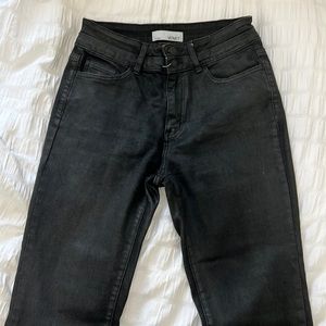 Black almost waxed like material pants